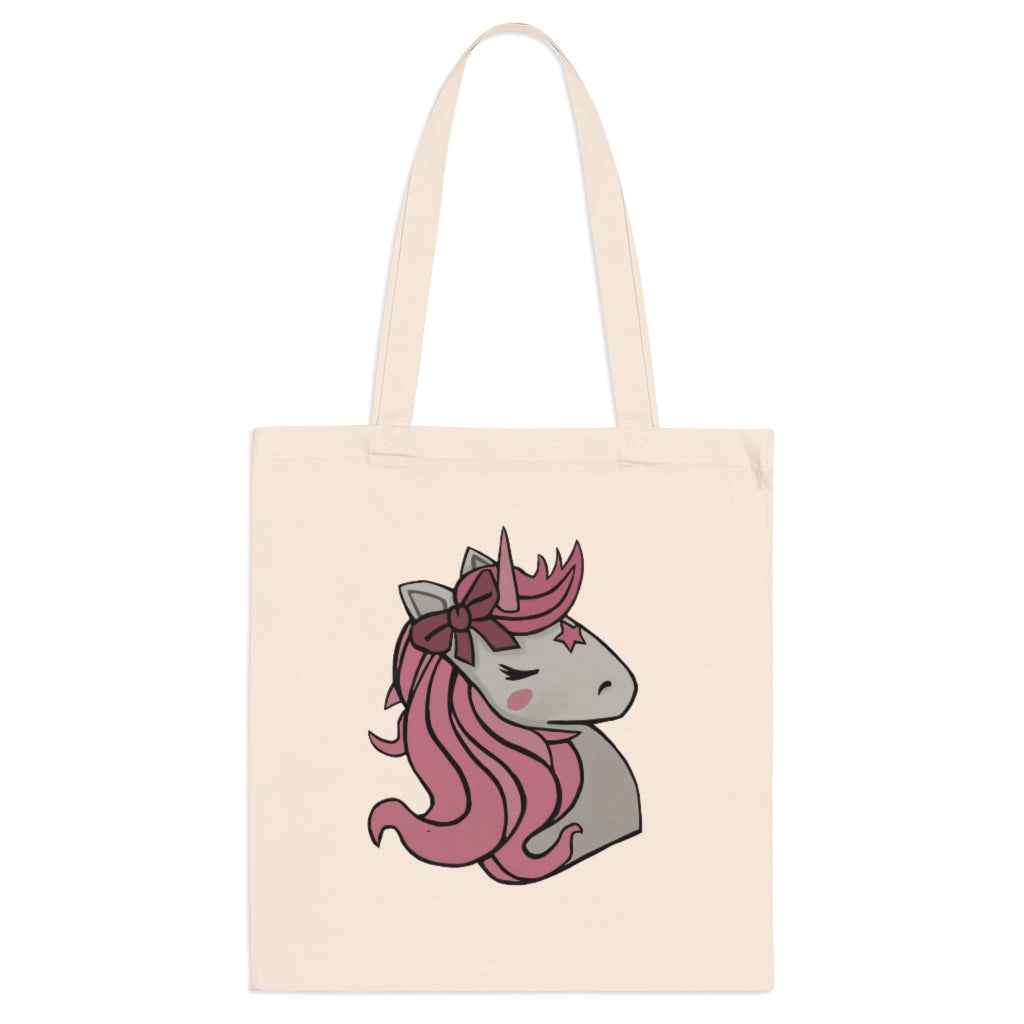 A stylish Pink Hair Unicorn Tote Bag made of 100% cotton with long handles and a vibrant unicorn design.