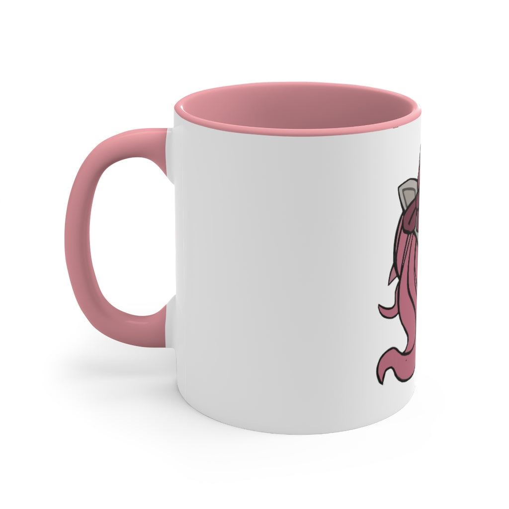 A vibrant pink unicorn accent coffee mug with a white exterior and pink interior, featuring a comfortable C-handle for easy gripping.