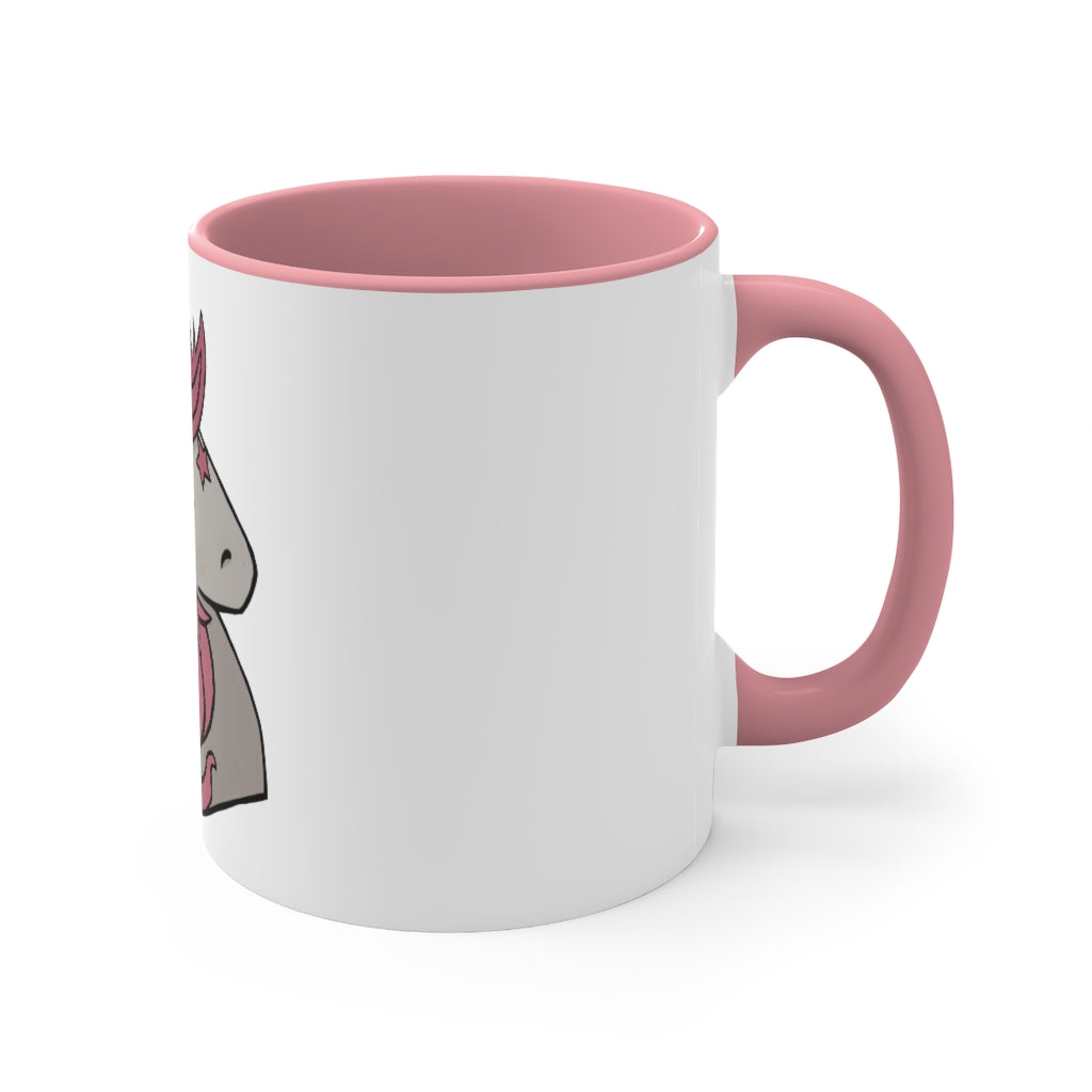 A vibrant pink unicorn accent coffee mug with a white exterior and pink interior, featuring a comfortable C-handle for easy gripping.