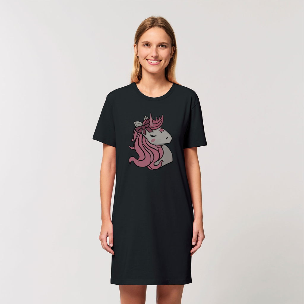 A vibrant pink t-shirt dress featuring a whimsical unicorn design, made from 100% organic cotton, perfect for casual wear.