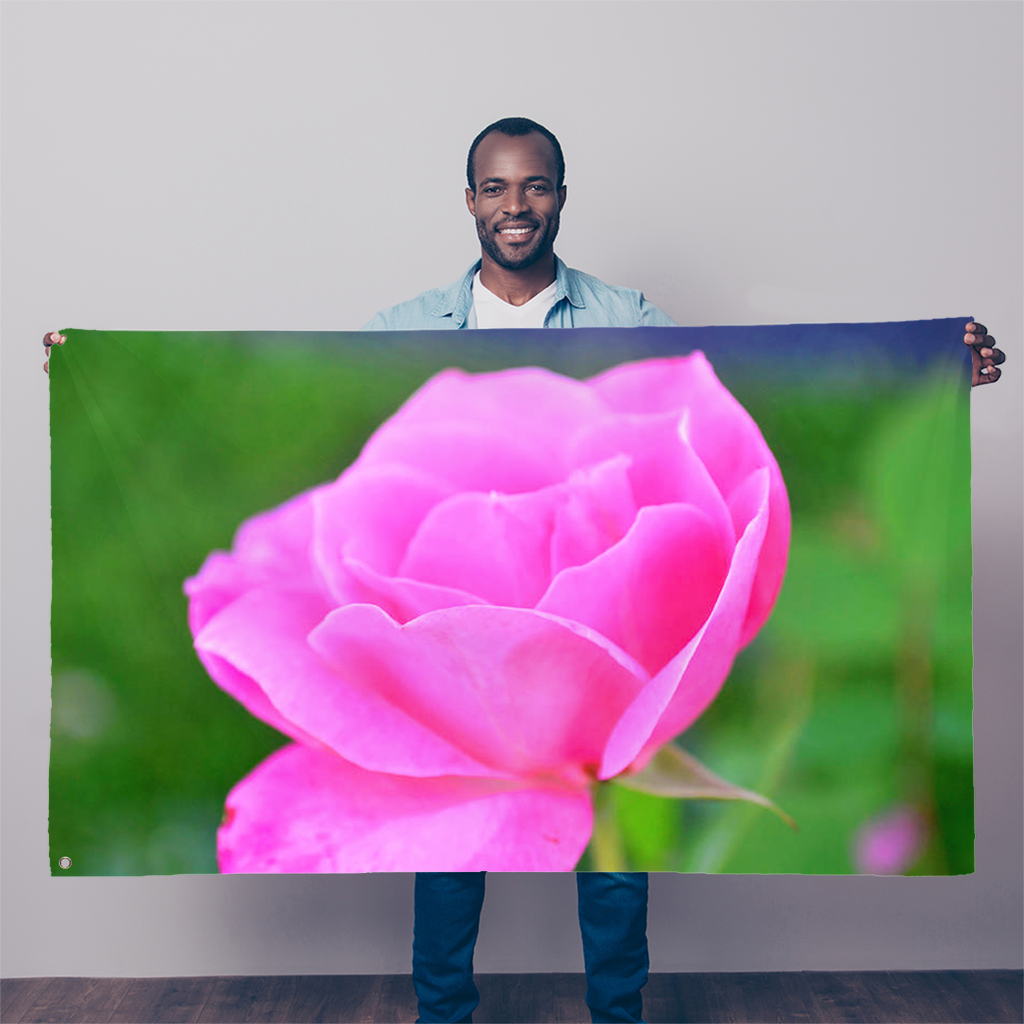 A vibrant PinkFlower Sublimation Flag measuring 5FT X 3FT, made from durable polyester fabric with double-stitched edges and two eyelets for easy hanging.