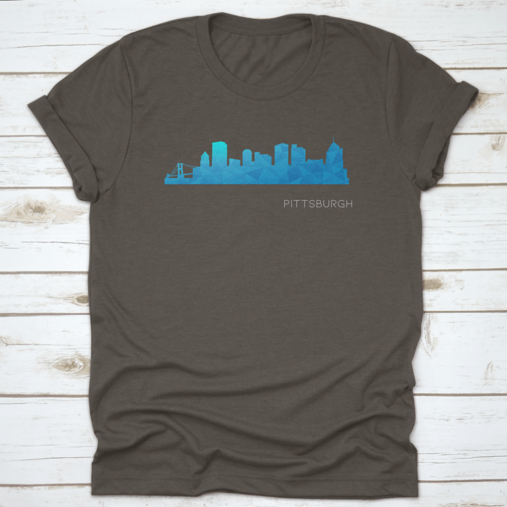 A vibrant blue low poly skyline design representing Pittsburgh, PA, showcasing iconic city landmarks in a modern artistic style.