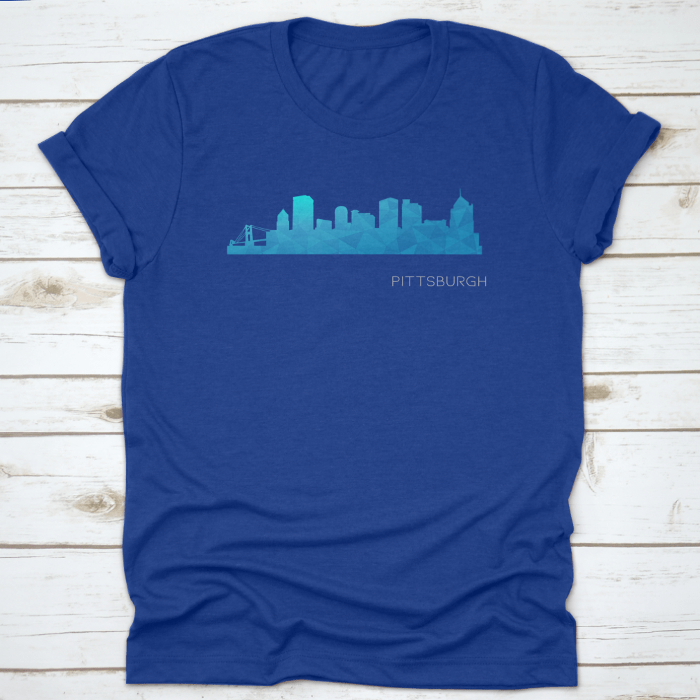 A vibrant blue low poly skyline design representing Pittsburgh, PA, showcasing iconic city landmarks in a modern artistic style.