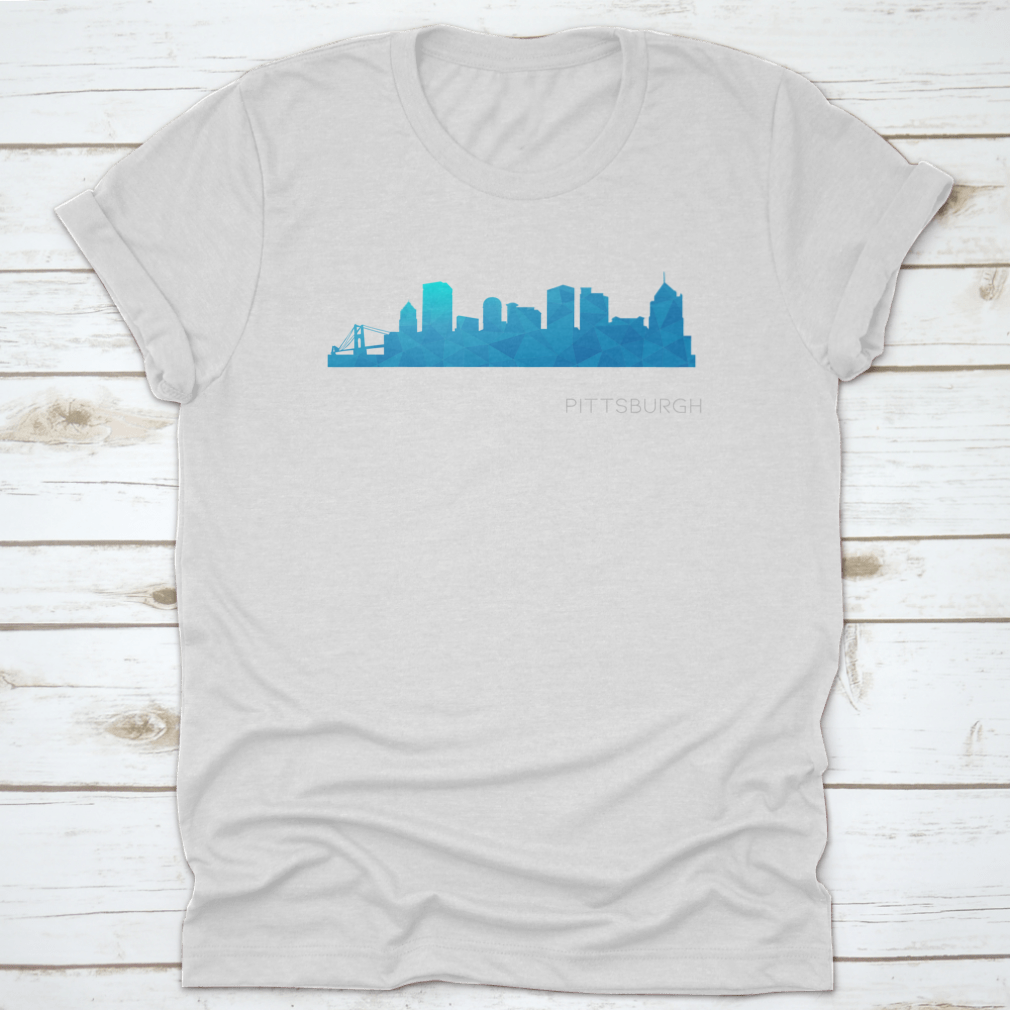 A vibrant blue low poly skyline design representing Pittsburgh, PA, showcasing iconic city landmarks in a modern artistic style.