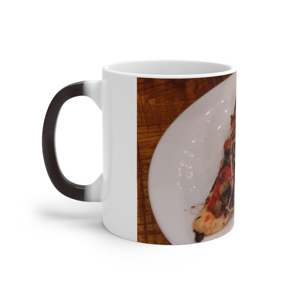 A whimsical Pizza Color Changing Mug showcasing its vibrant color transformation when filled with hot liquid.