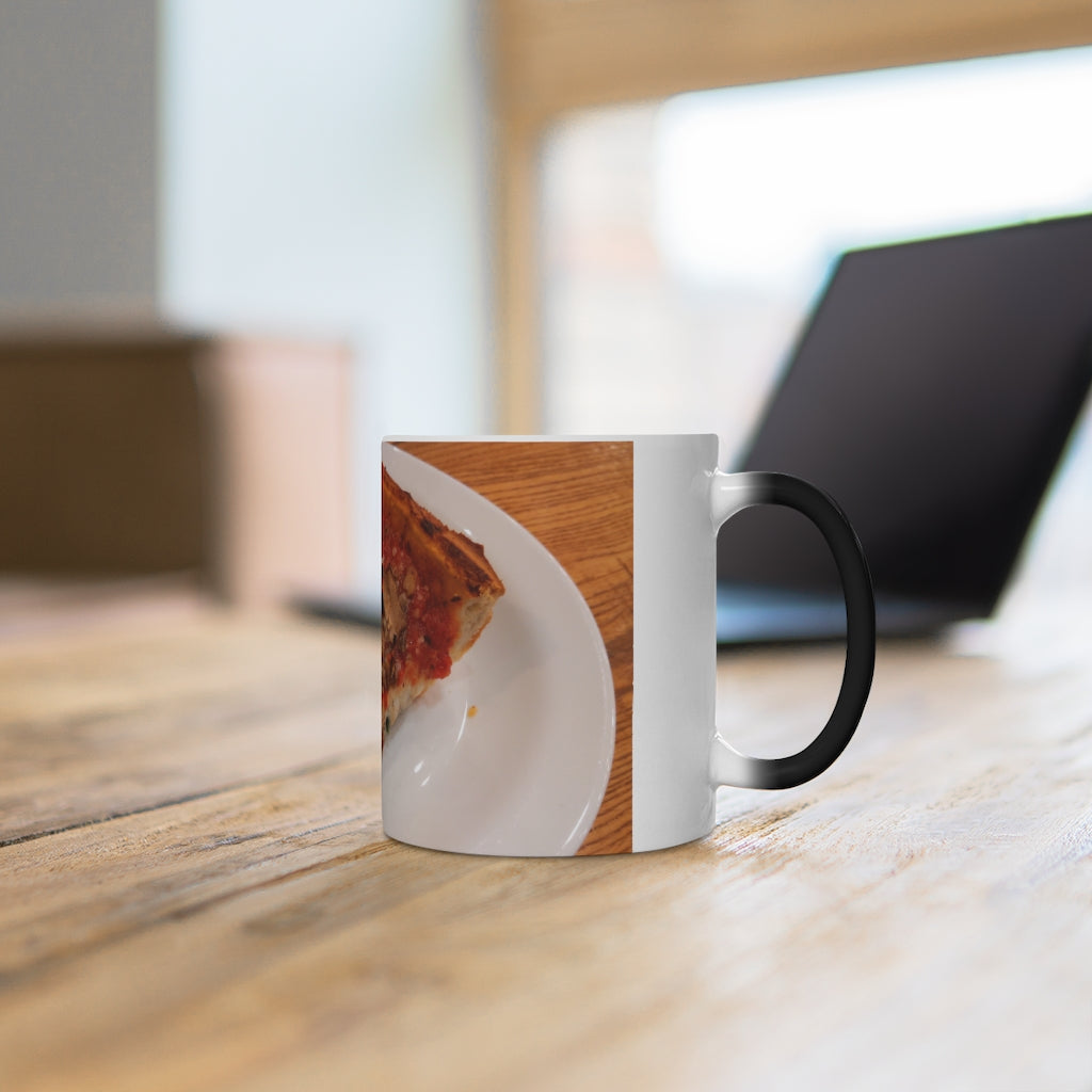 A whimsical Pizza Color Changing Mug showcasing its vibrant color transformation when filled with hot liquid.