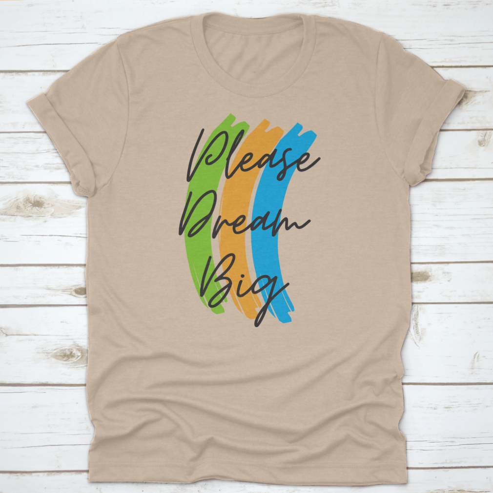 A stylish cotton t-shirt featuring the motivational text 'Please Dream Big' in a vibrant vector design, perfect for casual wear.