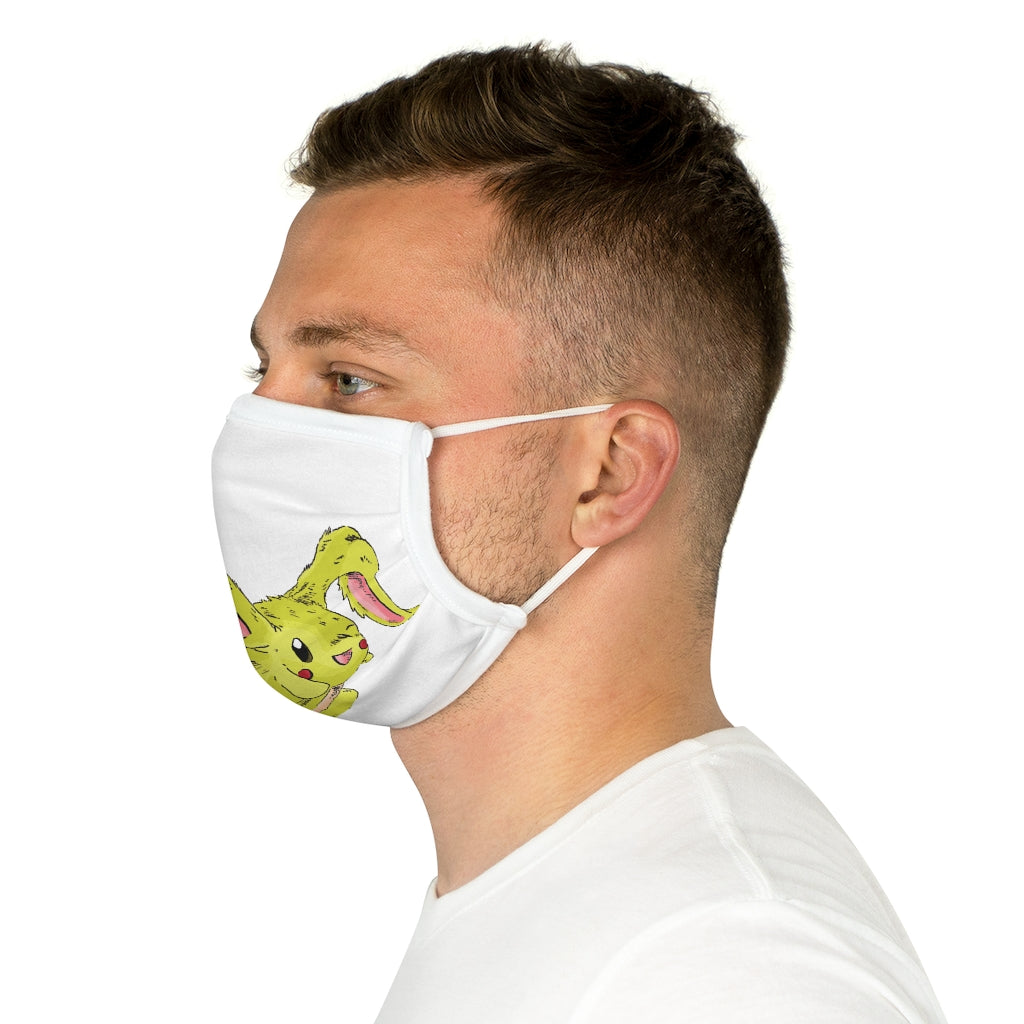 Pon-Pon Cotton Face Mask featuring vibrant motifs and adjustable earloops, made from 100% cotton for comfort and style.