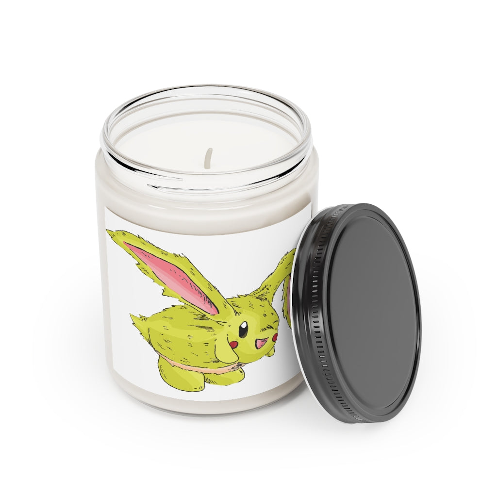 Pon-Pon Scented Candle in a glass container, featuring a permanent adhesive label, available in Cinnamon Stick and Vanilla fragrances.