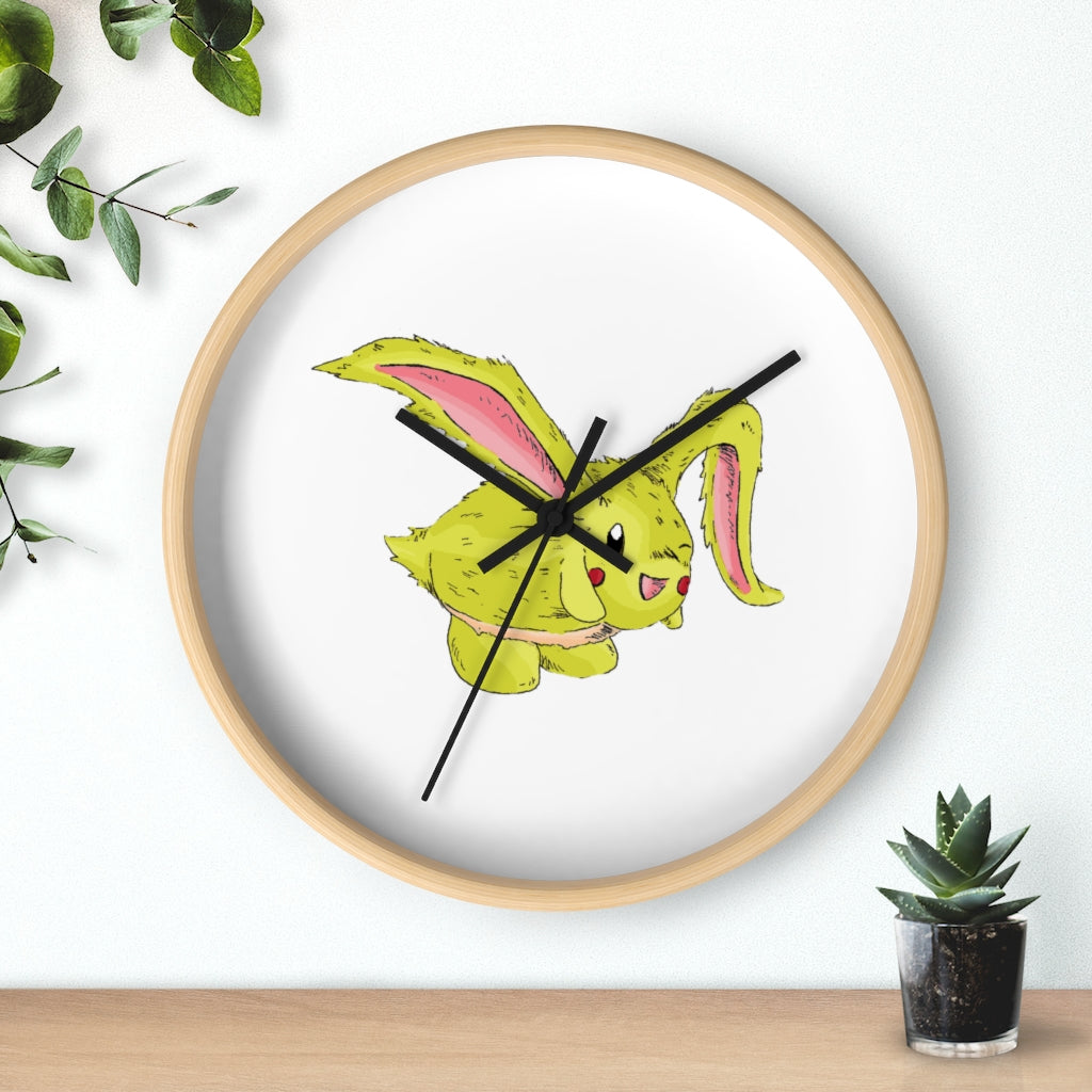 Pon-Pon Wall Clock featuring a wooden frame and clear plexiglass face, designed for indoor use with a silent mechanism.