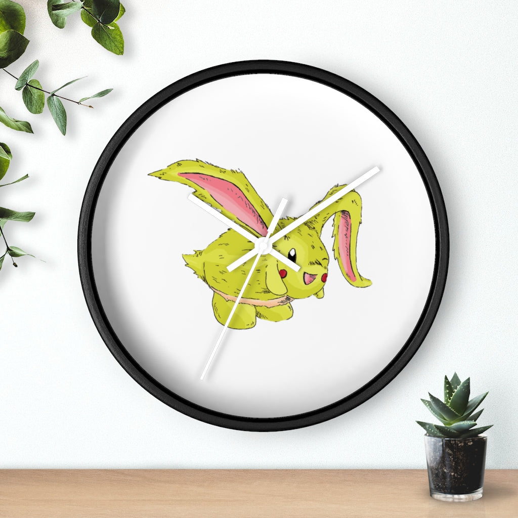 Pon-Pon Wall Clock featuring a wooden frame and clear plexiglass face, designed for indoor use with a silent mechanism.