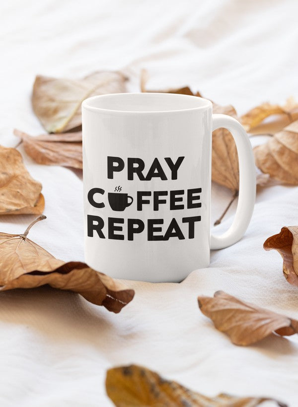 Pray Coffee Repeat Mug featuring a glossy finish and sturdy handle, perfect for coffee lovers.