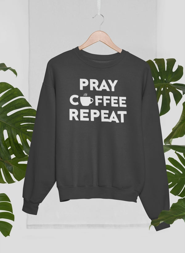 A cozy Pray Coffee Repeat Sweat Shirt made from 100% soft ring-spun cotton, featuring a unique digitally printed design.