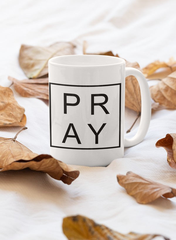 A stylish 11oz Pray Mug with a glossy finish and sturdy handle, perfect for coffee and tea.