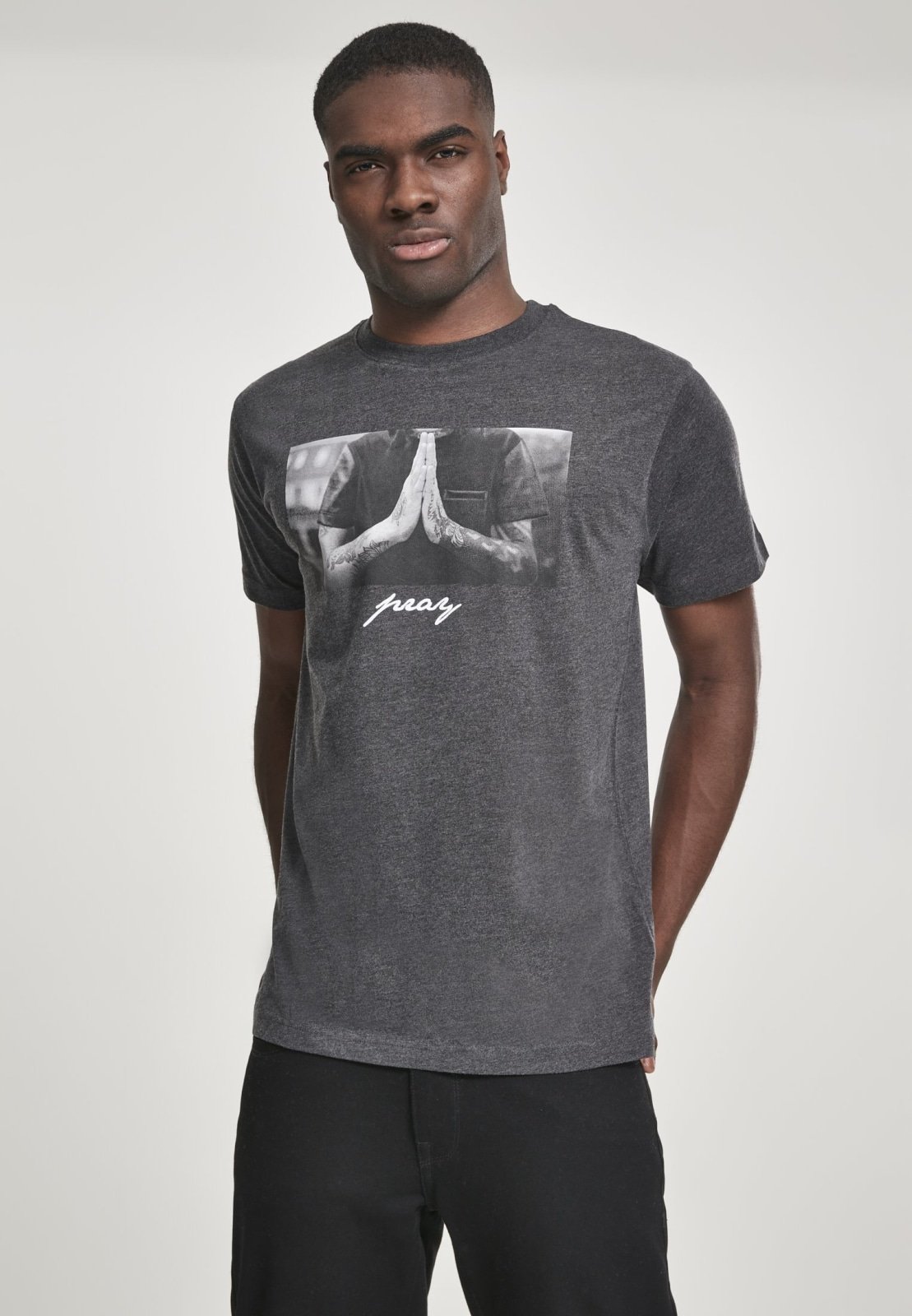 A stylish Pray T-Shirt made from 100% cotton, featuring a comfortable fit and versatile design suitable for casual wear.