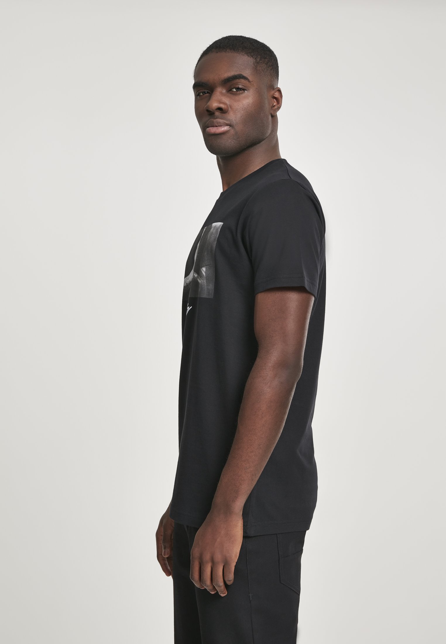 A stylish Pray T-Shirt made from 100% cotton, featuring a comfortable fit and versatile design suitable for casual wear.