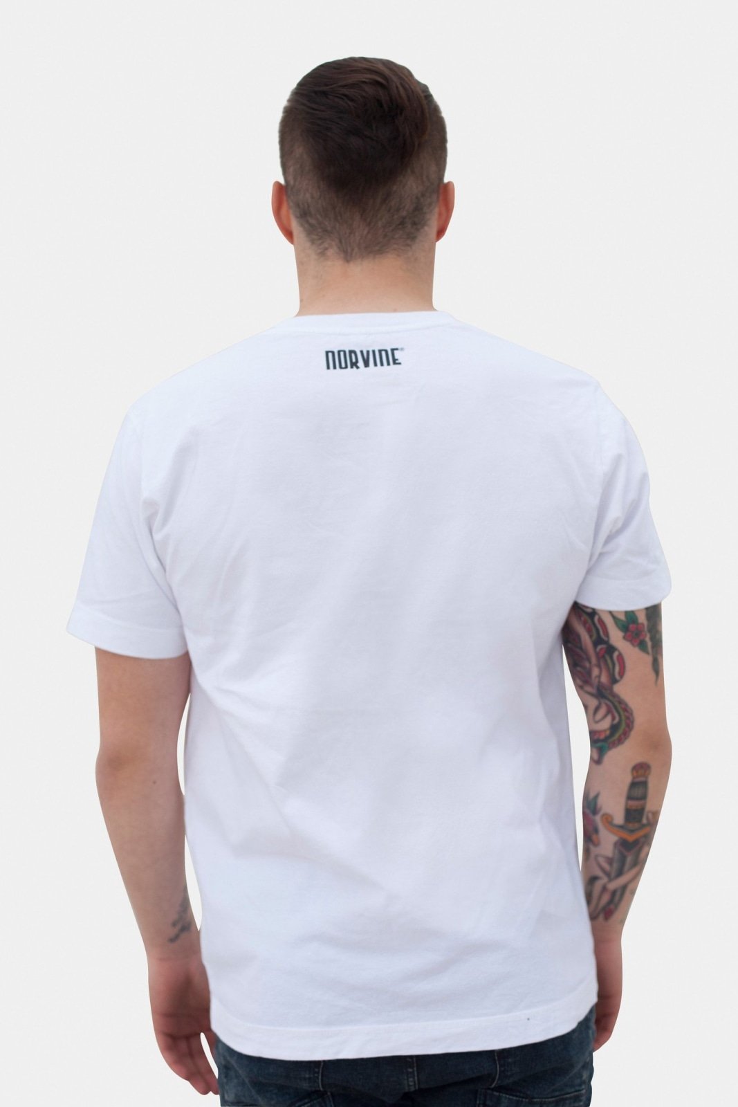 A stylish Prayer t-shirt made from 100% organic combed cotton, featuring the Norvine logo on the back.