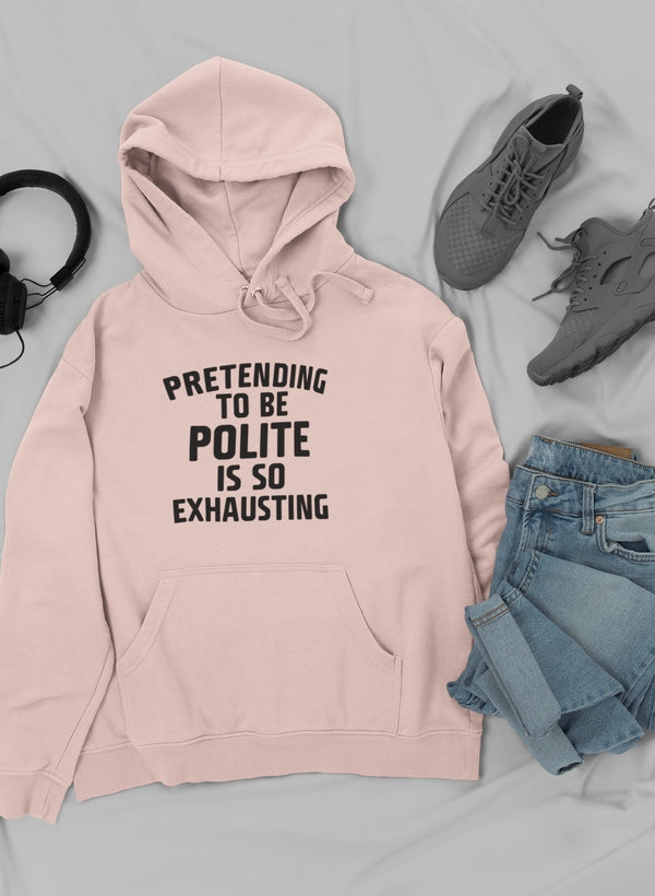 A stylish hoodie featuring the phrase 'Pretending To Be Polite', designed by top artists, showcasing a cozy fleece material.