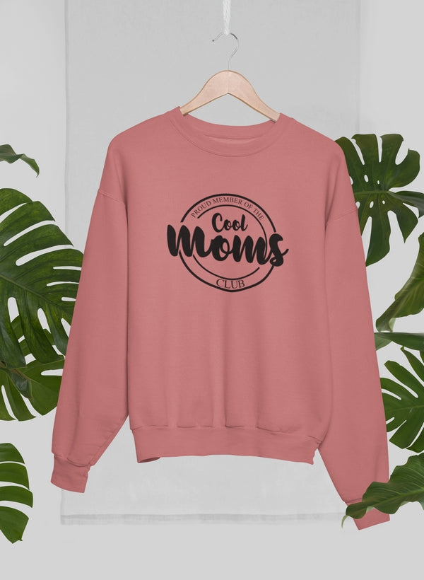 A stylish sweatshirt featuring the phrase 'Proud Member Of The Cool Moms Club' in vibrant print, made from soft ring-spun cotton.