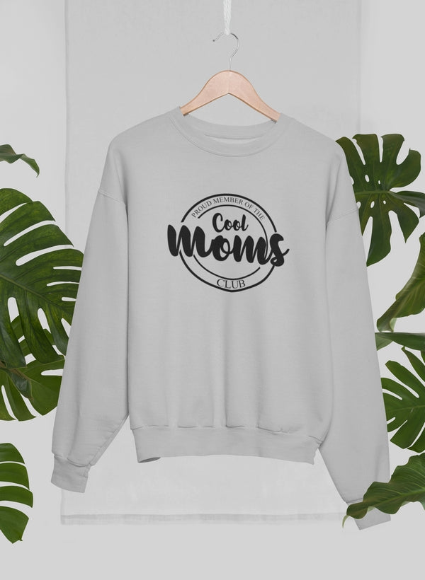 A stylish sweatshirt featuring the phrase 'Proud Member Of The Cool Moms Club' in vibrant print, made from soft ring-spun cotton.