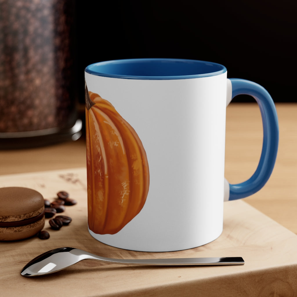 A vibrant pumpkin accent coffee mug with a white ceramic exterior and a contrasting pumpkin-colored interior and handle, perfect for coffee lovers.