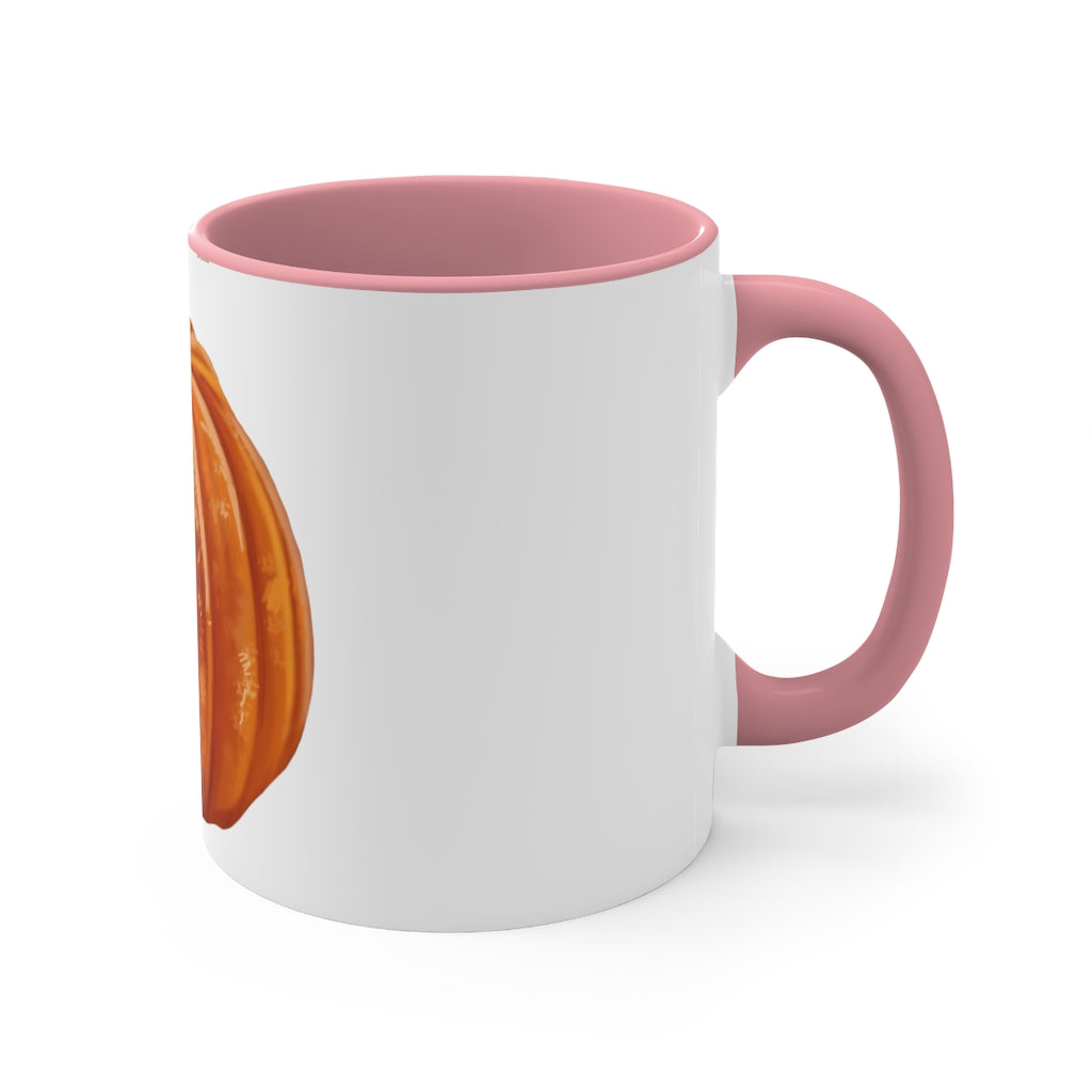 A vibrant pumpkin accent coffee mug with a white ceramic exterior and a contrasting pumpkin-colored interior and handle, perfect for coffee lovers.