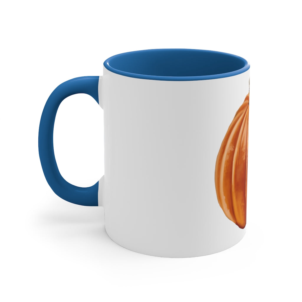 A vibrant pumpkin accent coffee mug with a white ceramic exterior and a contrasting pumpkin-colored interior and handle, perfect for coffee lovers.