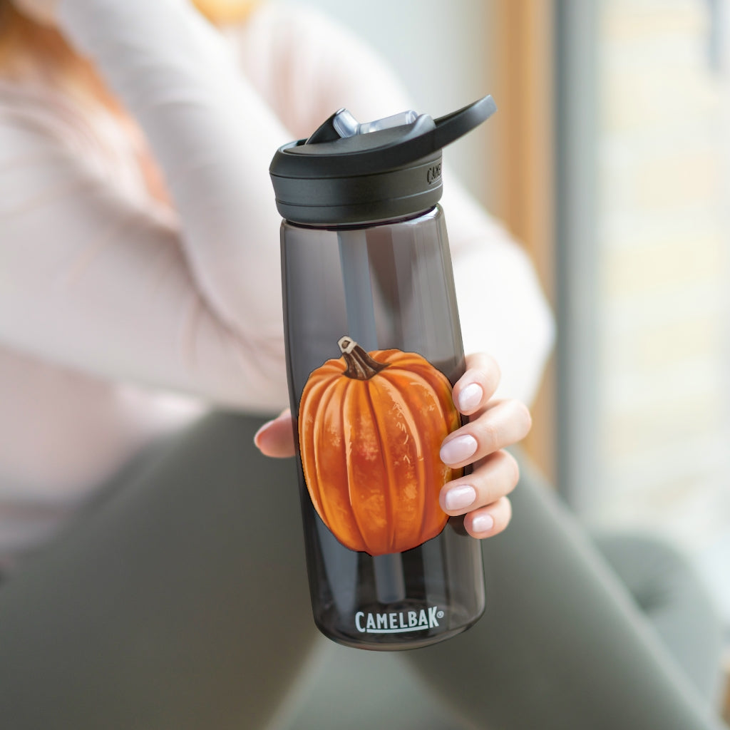 Pumpkin CamelBak Eddy® Water Bottle in vibrant orange color, showcasing its ergonomic design and spill-proof biting valve.