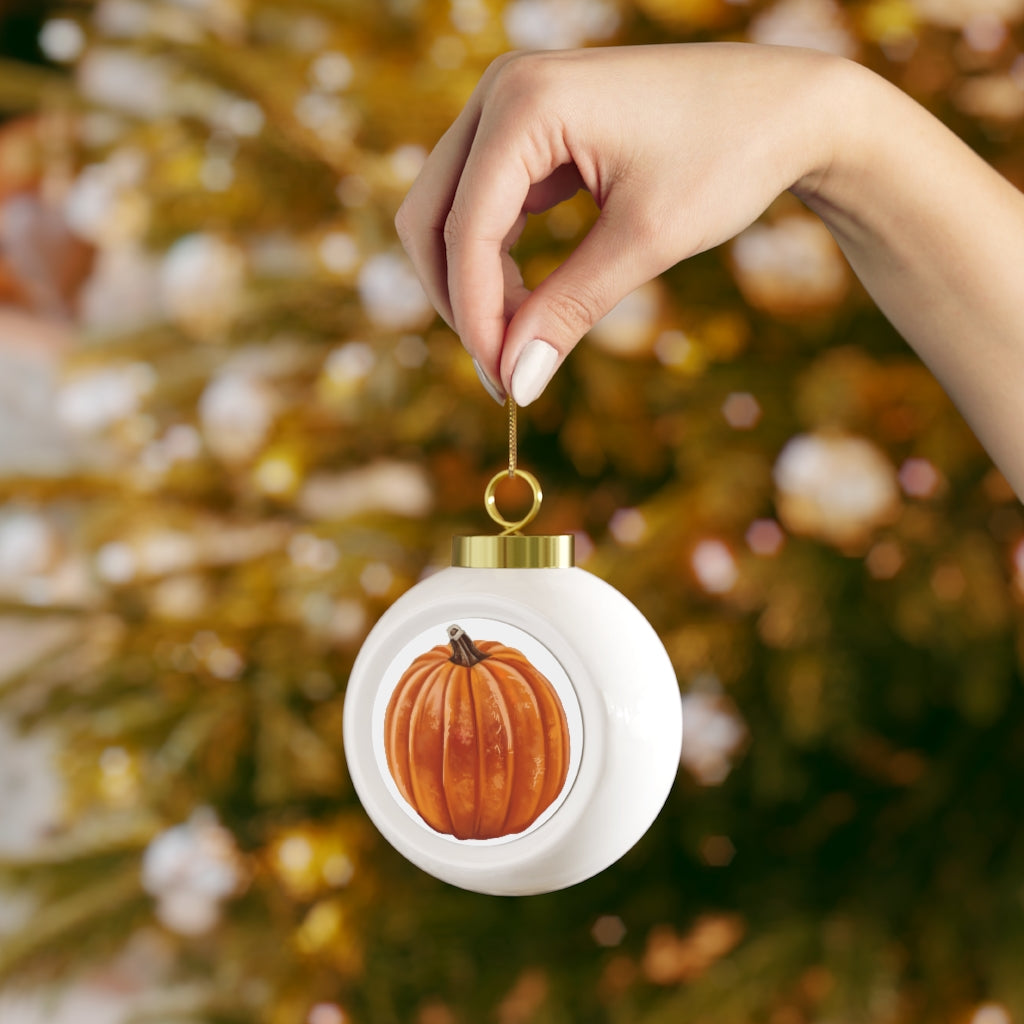 A beautifully crafted 3-inch Pumpkin Christmas Ball Ornament with a glossy finish and gold ribbon, featuring a vintage style design.