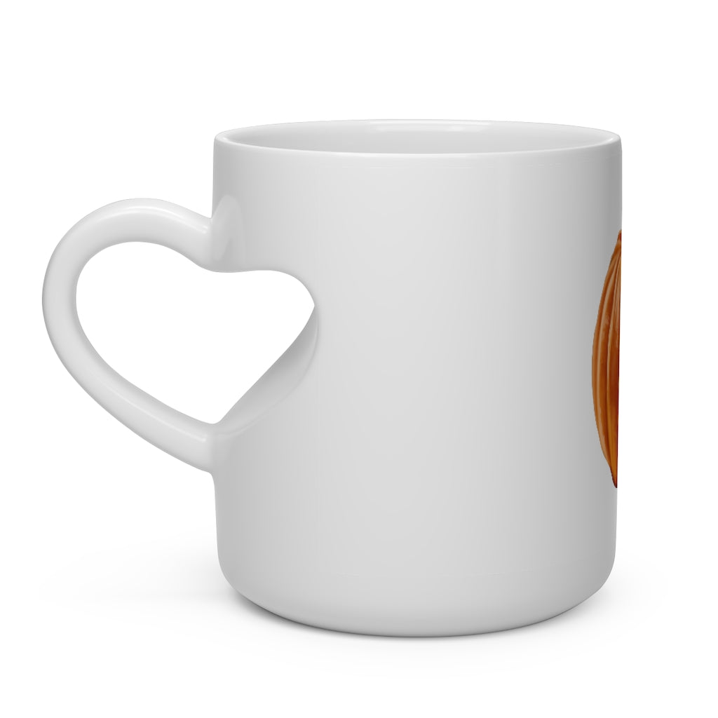 A white ceramic mug shaped like a heart with a heart-shaped handle, perfect for hot beverages.