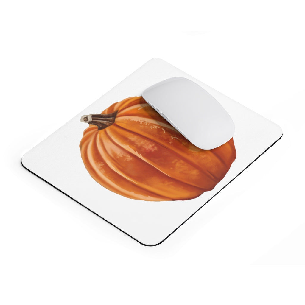 A vibrant pumpkin-themed mouse pad featuring a smooth neoprene surface, perfect for enhancing desk decor.