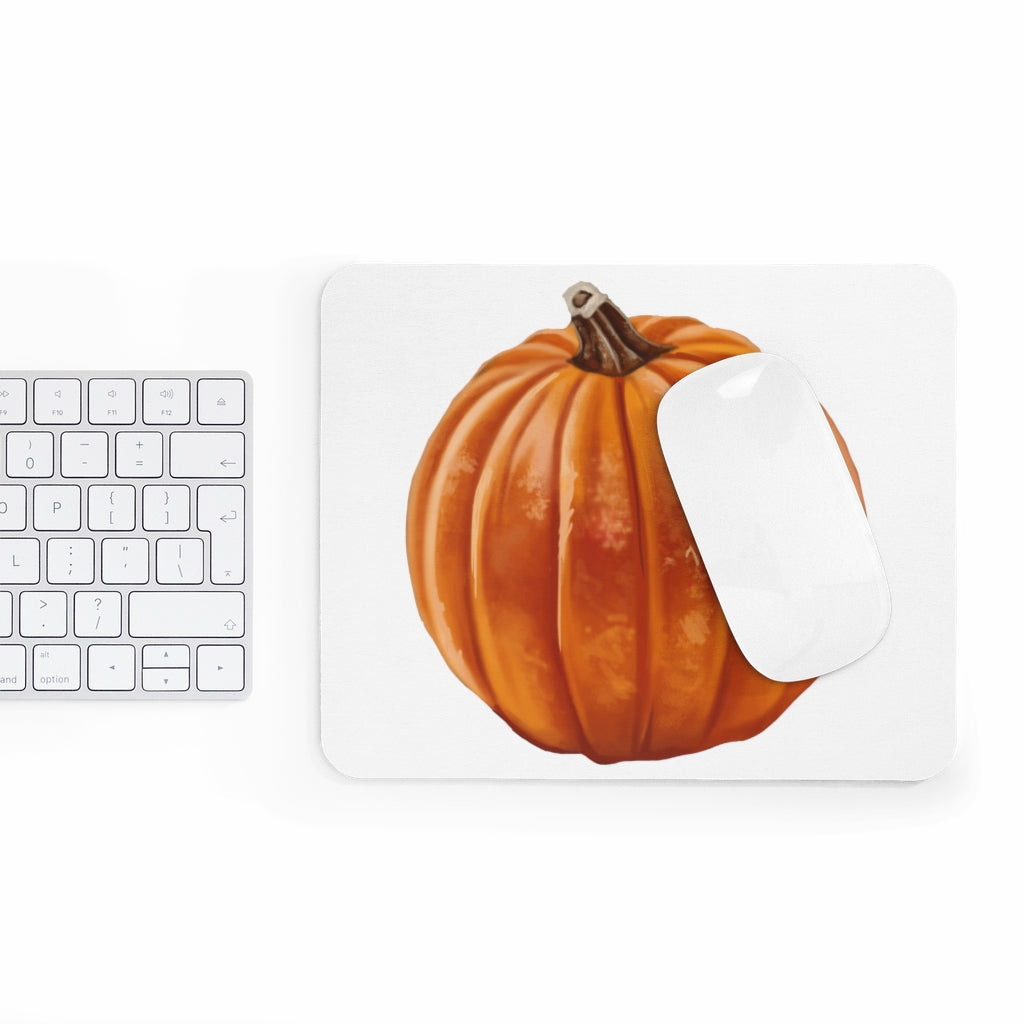 A vibrant pumpkin-themed mouse pad featuring a smooth neoprene surface, perfect for enhancing desk decor.