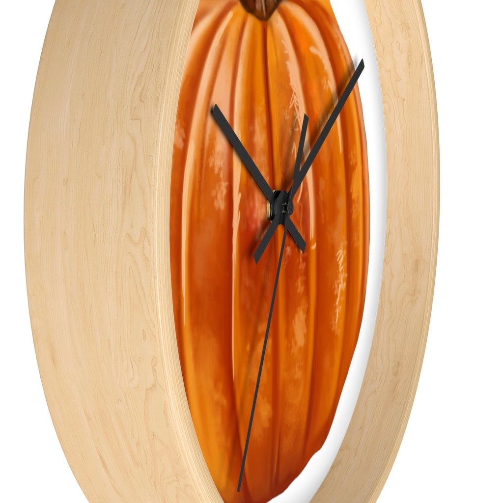 A stylish Pumpkin Wall Clock featuring a wooden frame and plexiglass face, perfect for indoor decor.