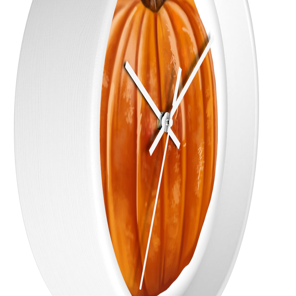 A stylish Pumpkin Wall Clock featuring a wooden frame and plexiglass face, perfect for indoor decor.