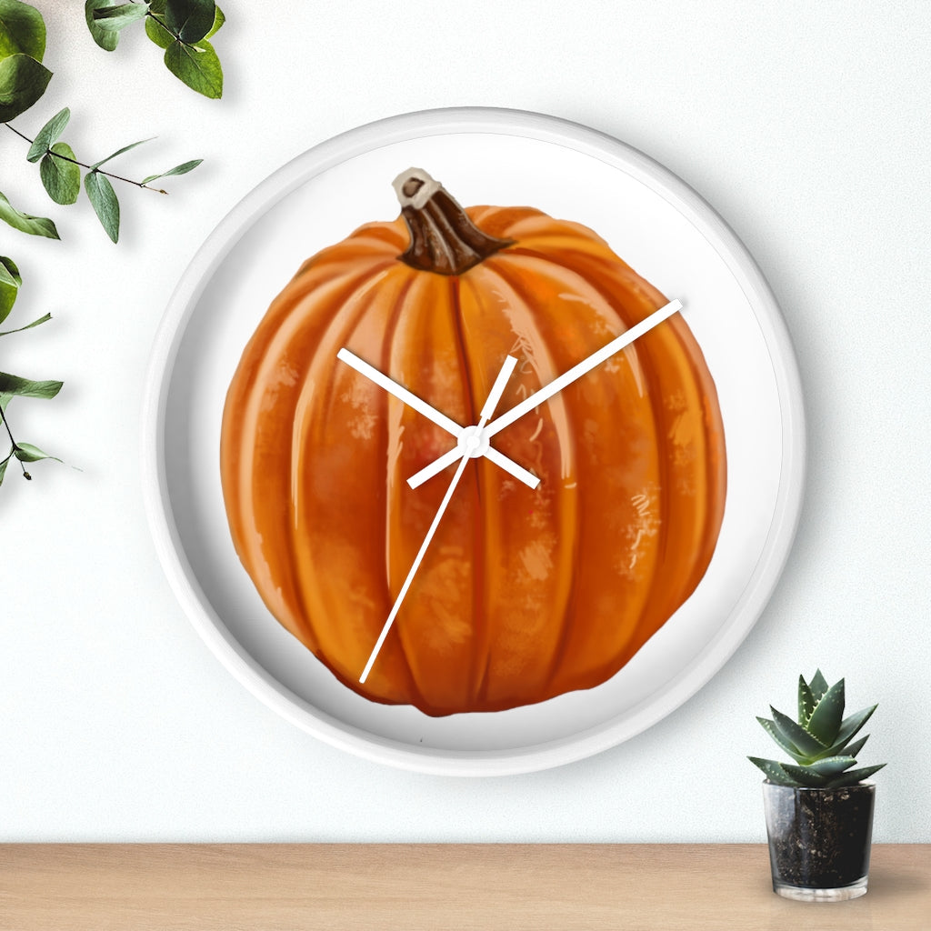 A stylish Pumpkin Wall Clock featuring a wooden frame and plexiglass face, perfect for indoor decor.