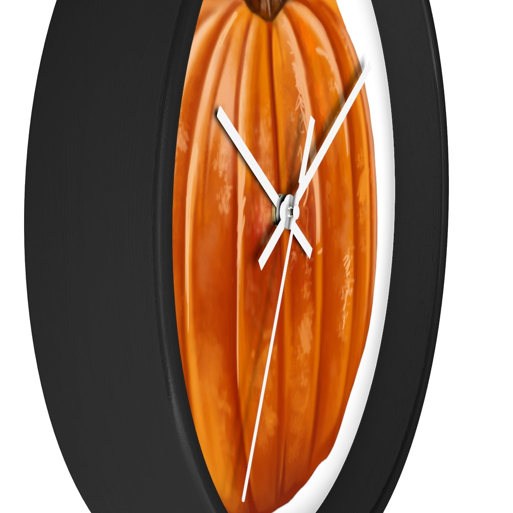 A stylish Pumpkin Wall Clock featuring a wooden frame and plexiglass face, perfect for indoor decor.