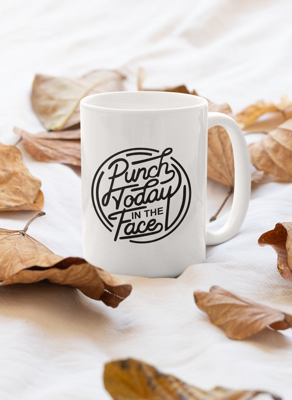 A high-quality 11oz ceramic mug with a glossy finish featuring the phrase 'Punch Today In The Face' in bold letters.