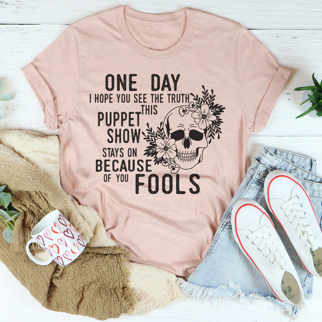 A Puppet Show T-Shirt made of soft ring-spun cotton, featuring double stitching for durability and a vibrant DTG printed design.