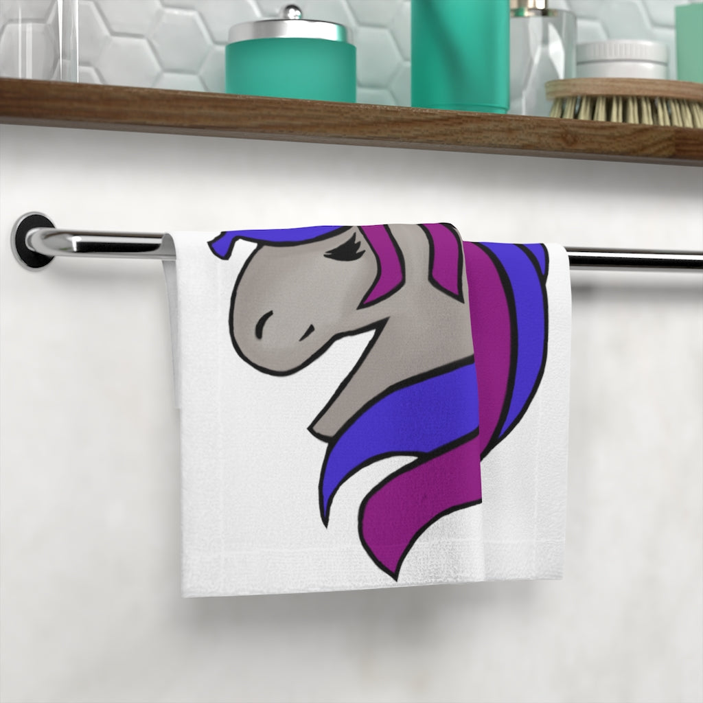 Purple Blue Unicorn Face Towel featuring a vibrant unicorn design on a soft polyester blend front and absorbent cotton back.