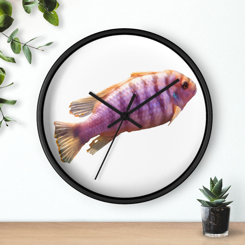 A vibrant purple fish wall clock with a wooden frame and plexiglass face, showcasing a unique design perfect for home decor.