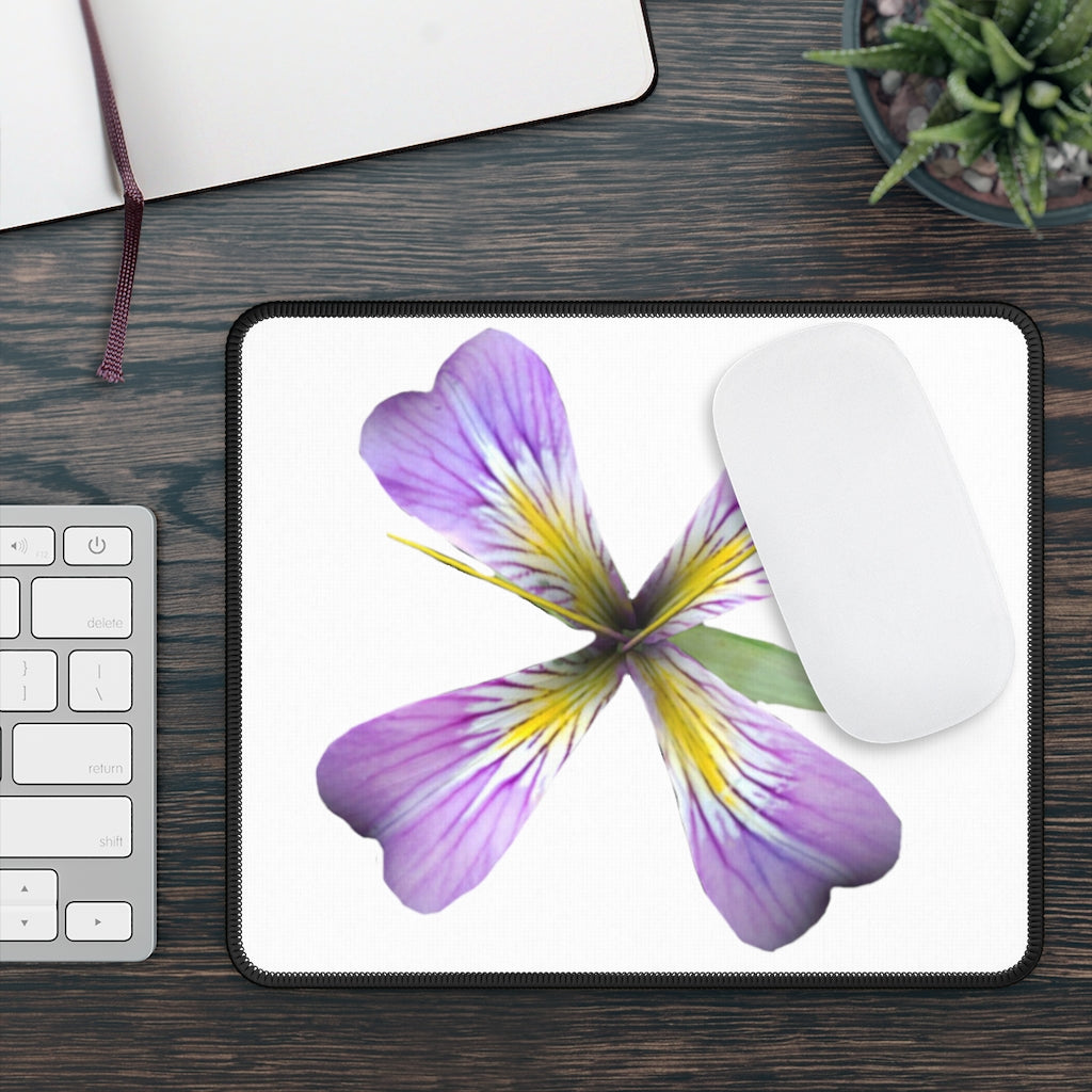 Purple Flower Gaming Mouse Pad featuring vibrant floral design and stitched edges for durability.