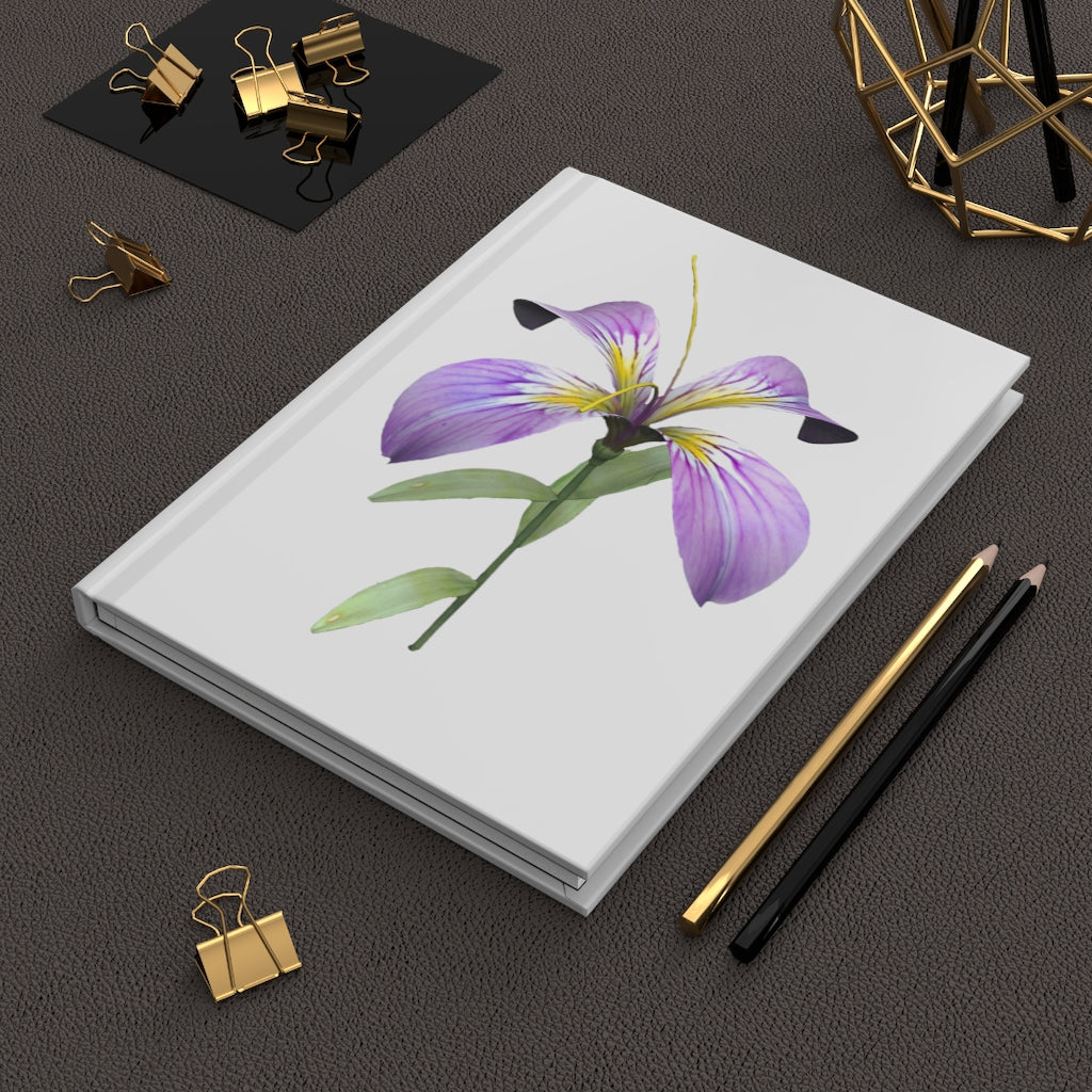 Purple Flower Hardcover Journal with matte finish, featuring a floral design on the cover and lined pages inside.