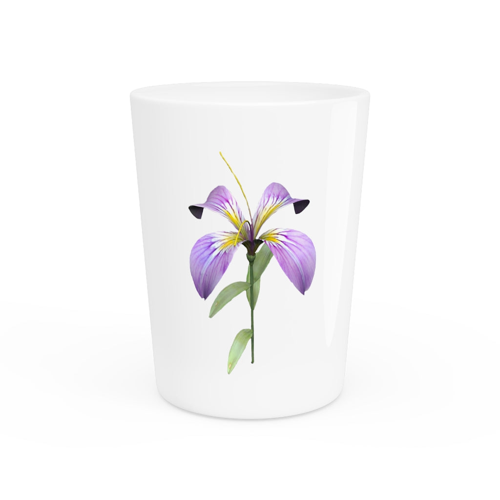 A personalized Purple Flower Shot Glass with a ceramic finish, featuring a vibrant purple floral design and available with a white or black interior.