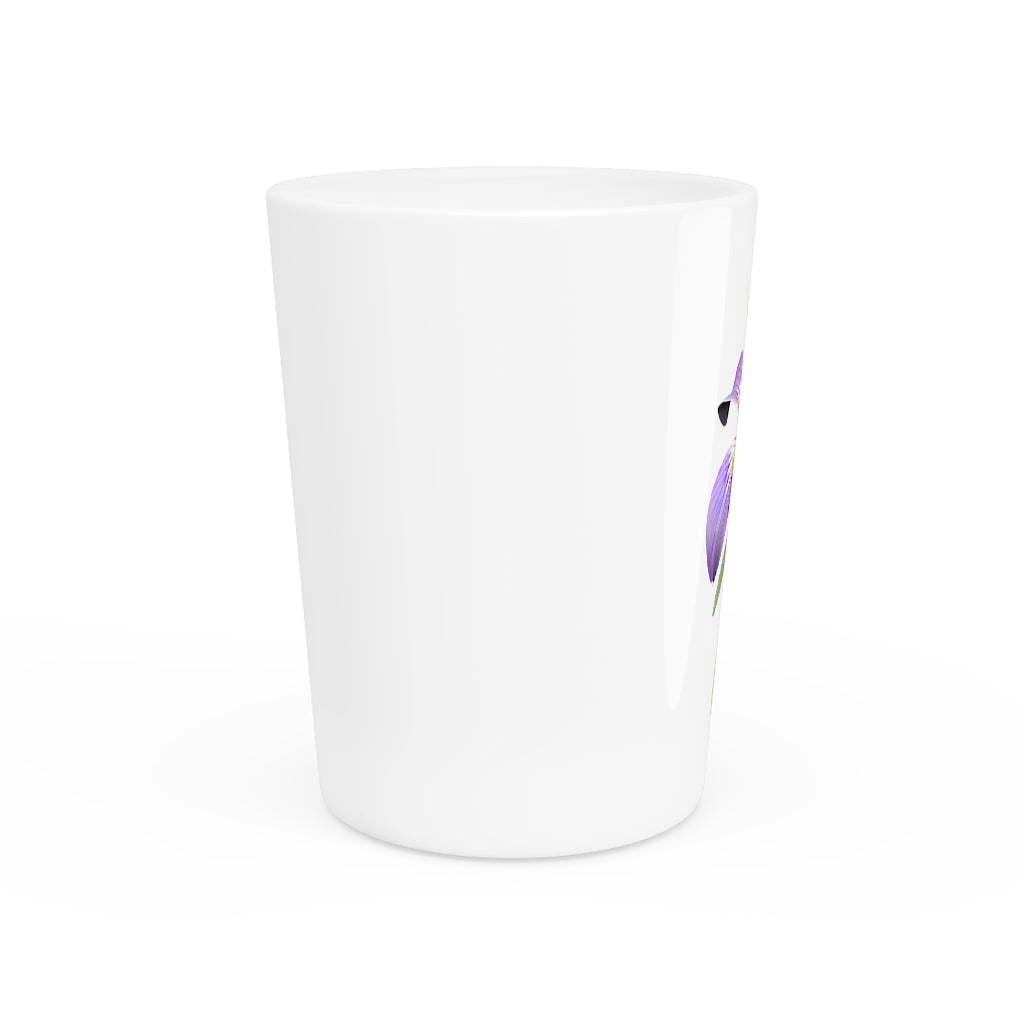 A personalized Purple Flower Shot Glass with a ceramic finish, featuring a vibrant purple floral design and available with a white or black interior.