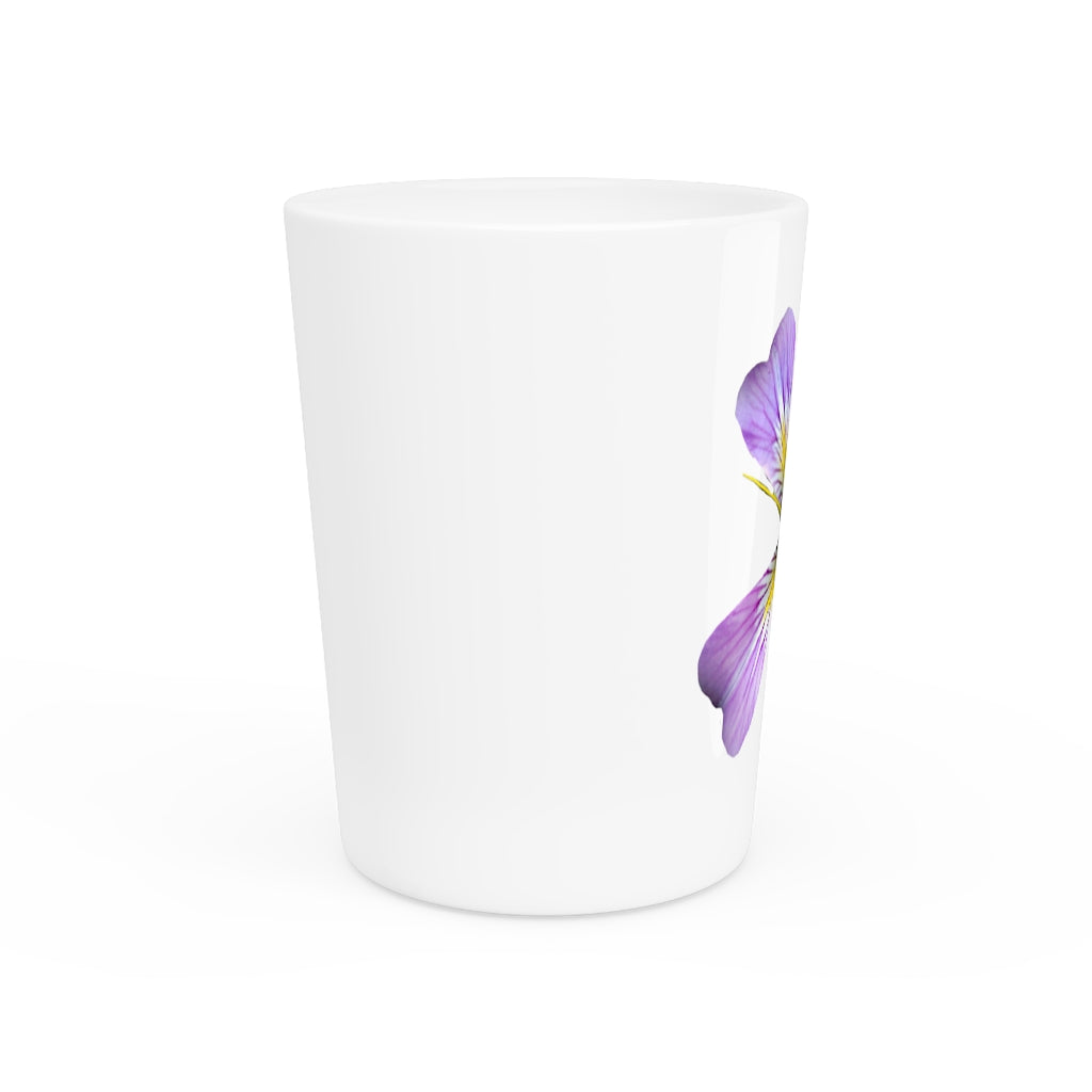 A personalized Purple Flower Shot Glass with a white ceramic finish and a black interior, showcasing its elegant design.