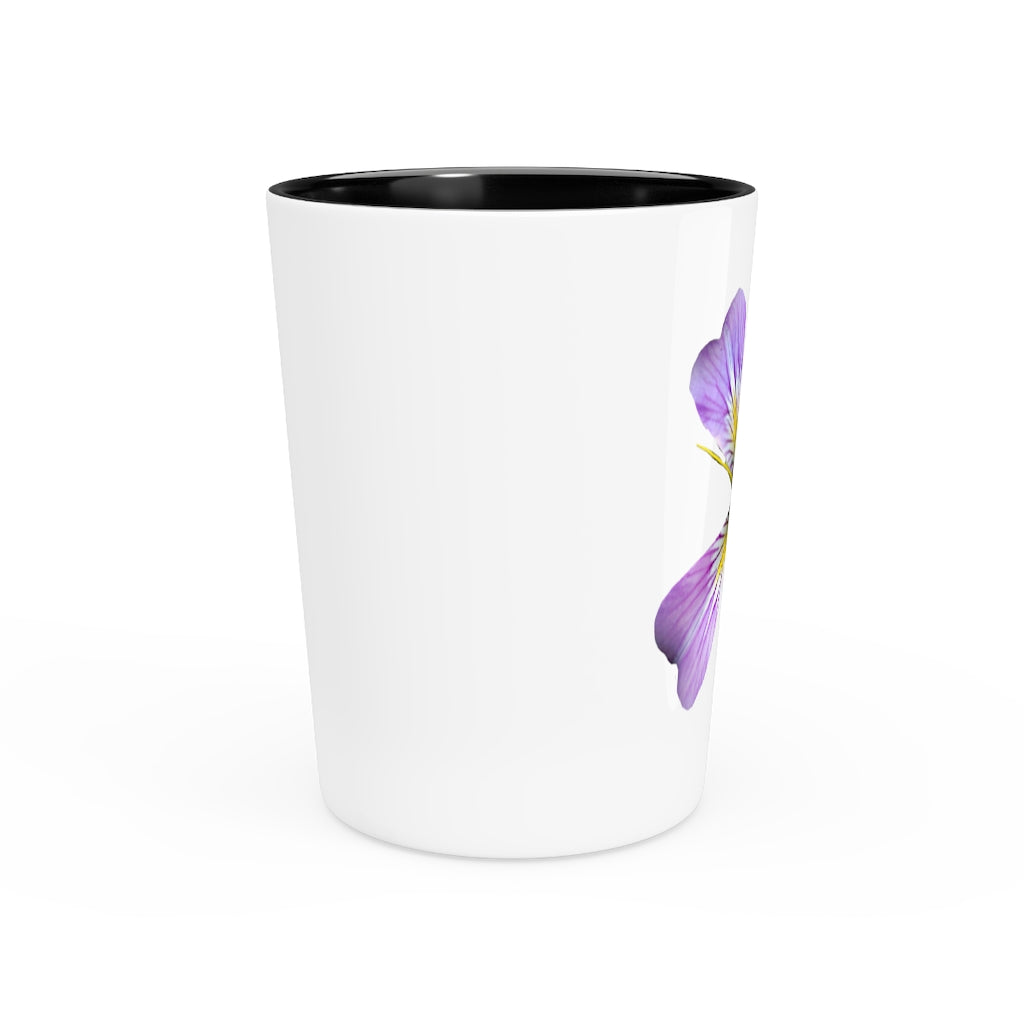 A personalized Purple Flower Shot Glass with a white ceramic finish and a black interior, showcasing its elegant design.