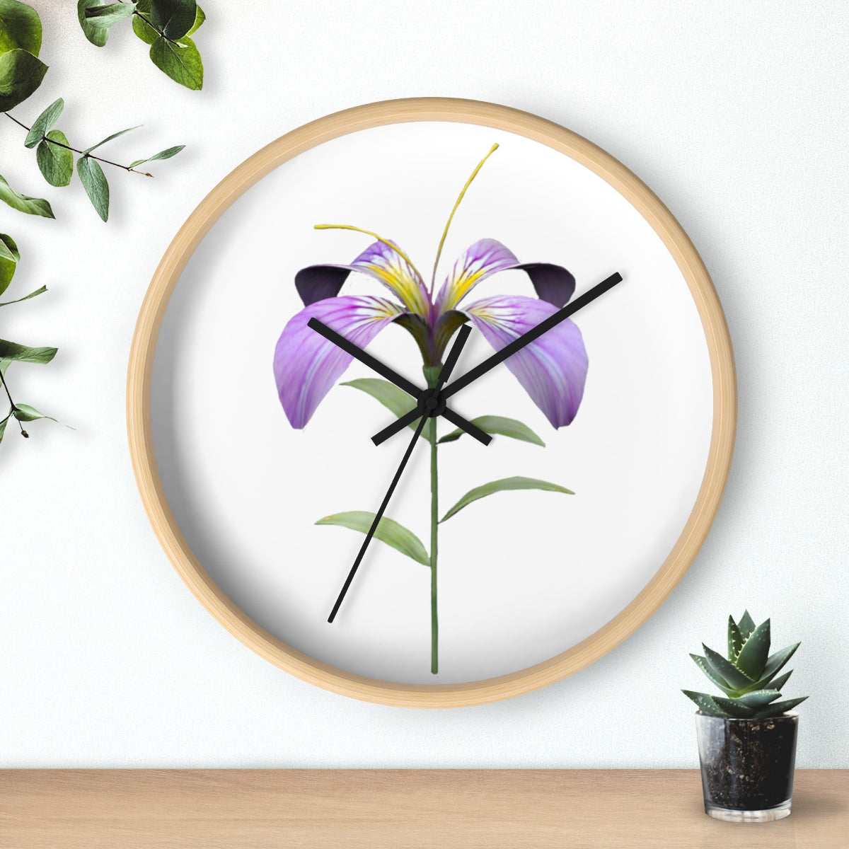 A vibrant purple flower wall clock with a wooden frame and plexiglass face, showcasing intricate floral design.