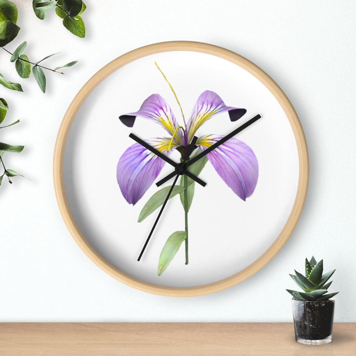 A stylish Purple Flower Wall Clock featuring a wooden frame and plexiglass face, showcasing a vibrant floral design.