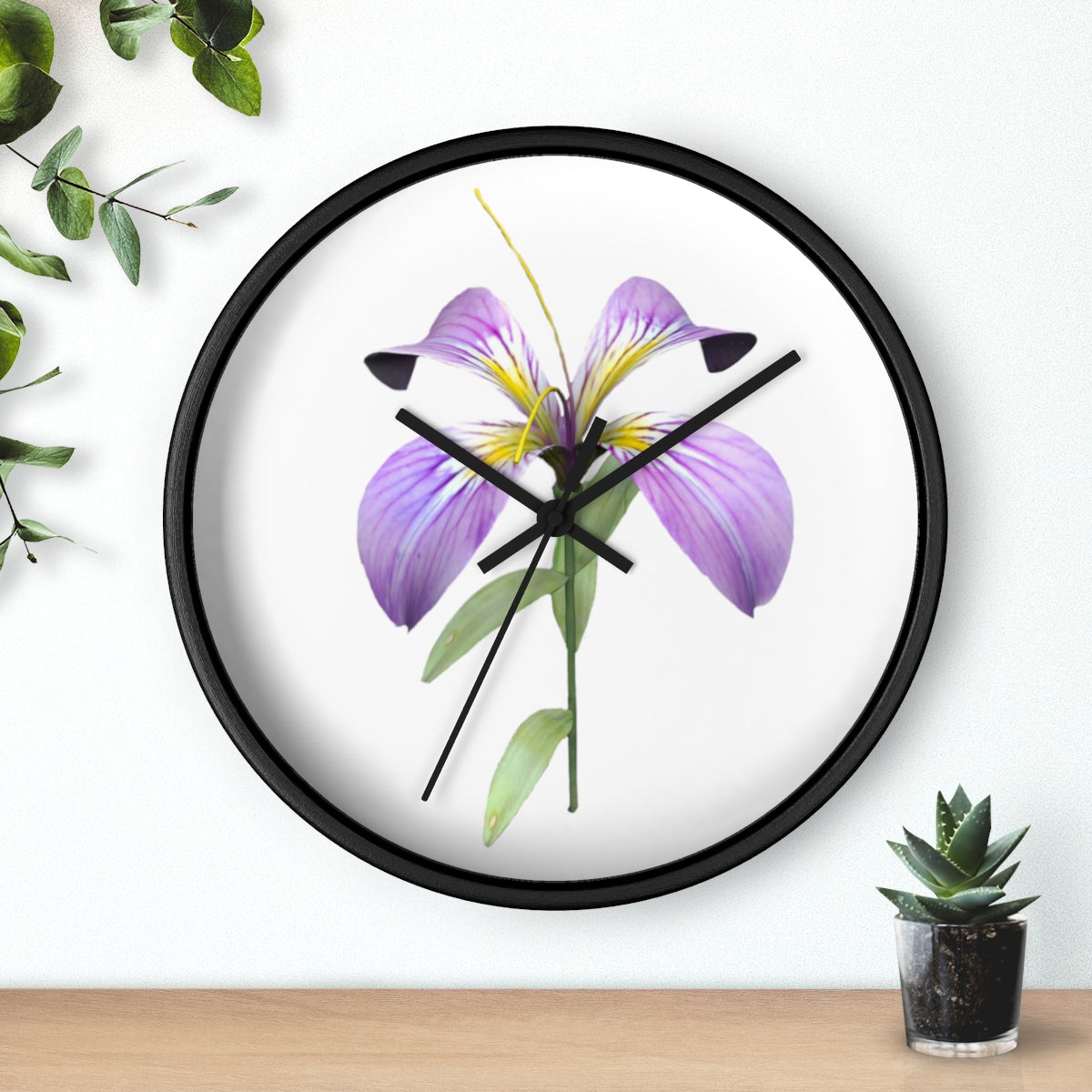 A stylish Purple Flower Wall Clock featuring a wooden frame and plexiglass face, showcasing a vibrant floral design.