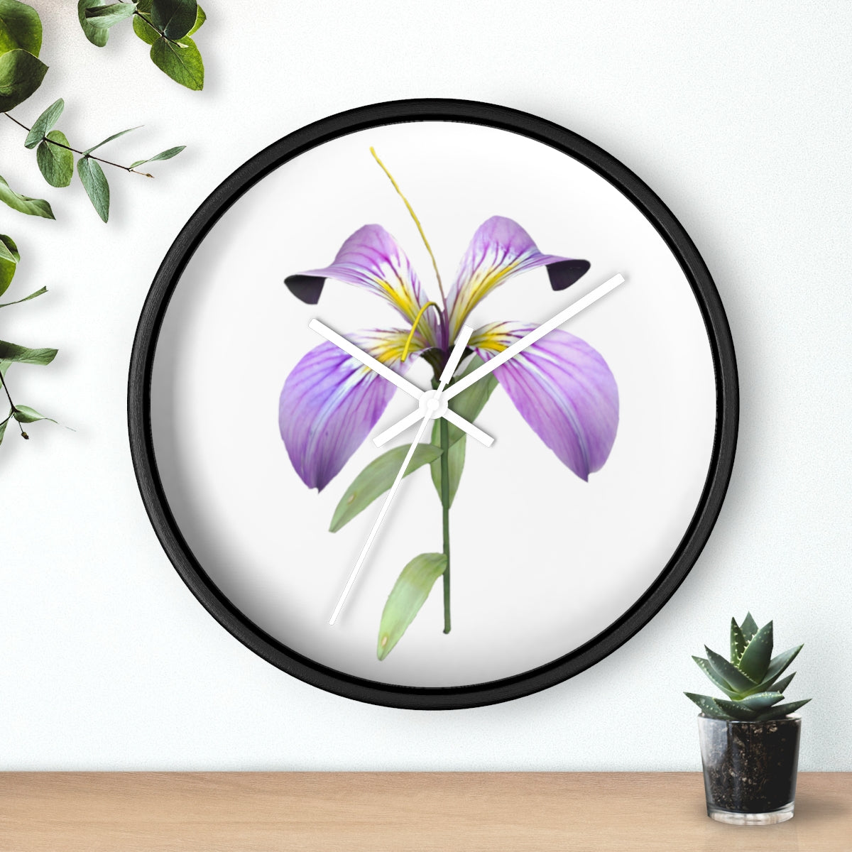 A stylish Purple Flower Wall Clock featuring a wooden frame and plexiglass face, showcasing a vibrant floral design.